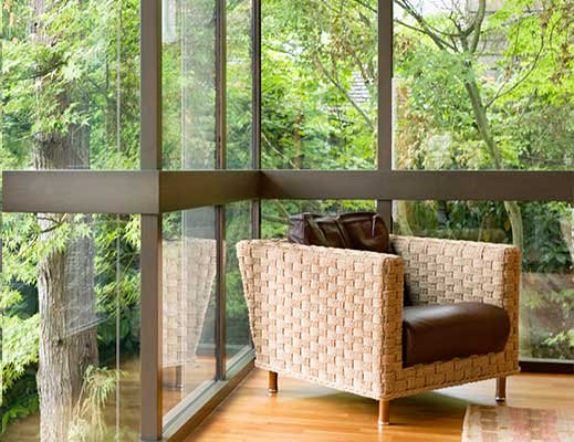 Sunlit room with large windows